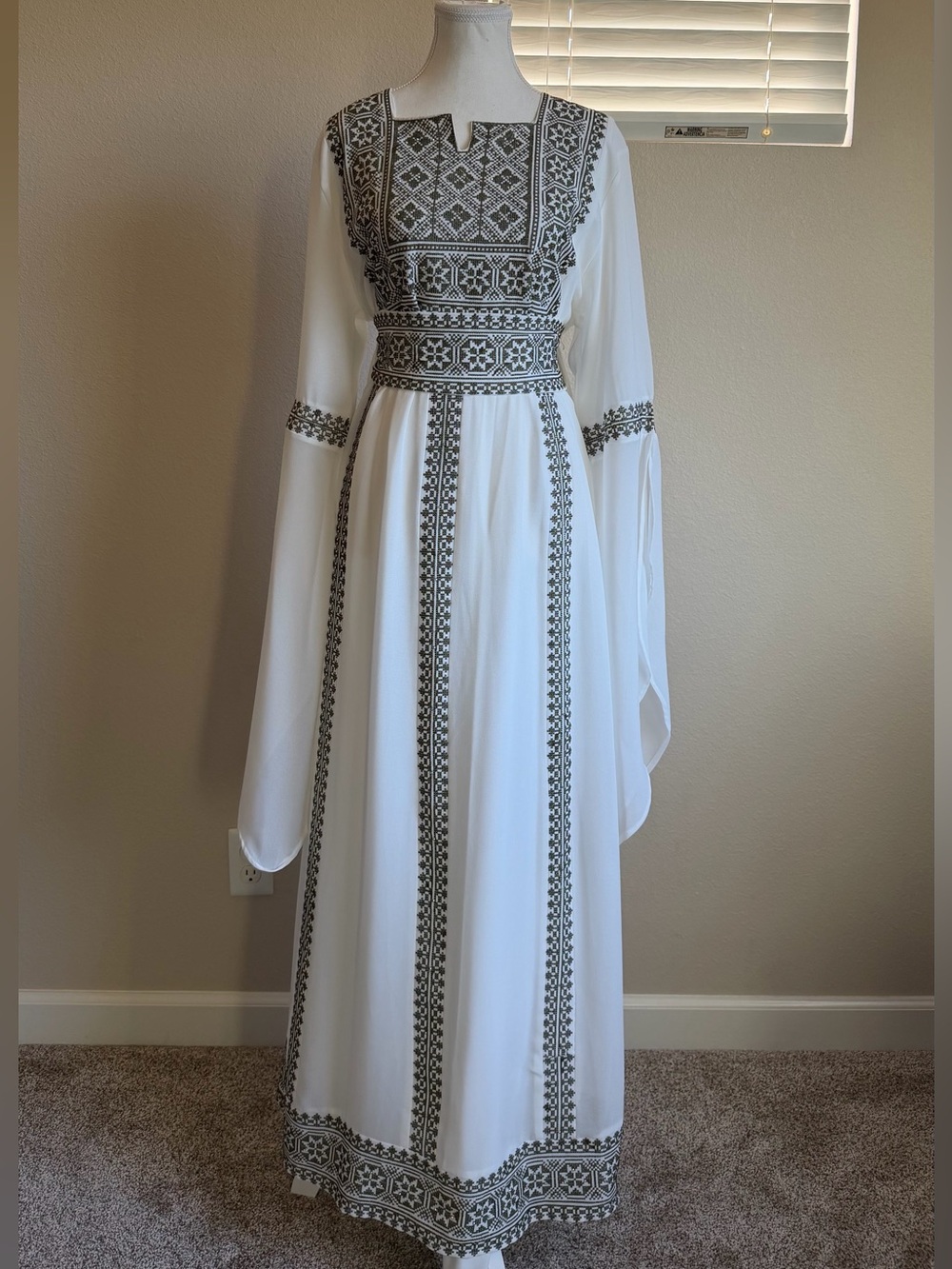 Embroidered White and Olive Palestinian Thobe with dramatic sleeves